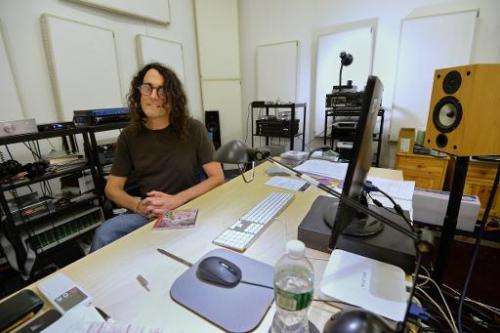 David Chesky, a composer with his own record label, poses for a photo at his studio in New York, on December 10, 2013