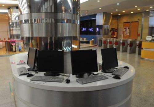 Disconnected computer monitors are seen at the Korean Broadcasting System headquarters in Seoul on March 20, 2013