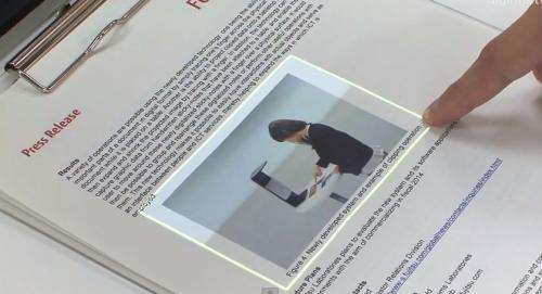 Fujitsu unveils device that lets printed paper become interactive (w/ video)