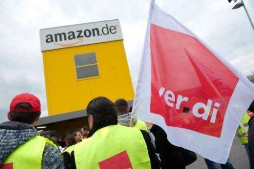 Employees of online retailer Amazon take part in a demonstration in Bad Hersfeld, central Germany, on April 9, 2013