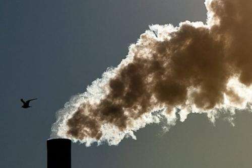 EU greenhouse gas emissions, blamed for global warming, dropped slightly last year