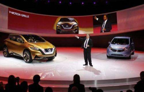 Executive VP of Nissan introduces its concept hybrid-electric car at the Detroit auto show, January 15, 2013, Michigan