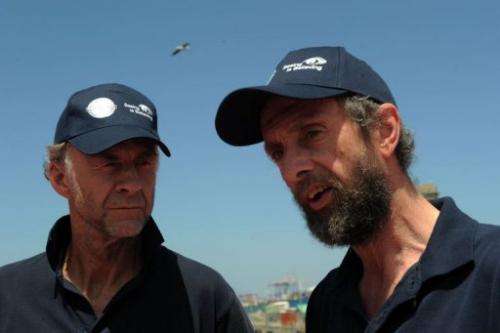 Explorers Sir Ranulph Fiennes (L) and Anton Bowring talk to journalists on January 6, 2013 in Cape Town