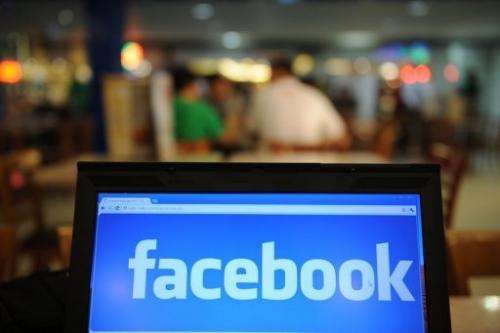 Facebook's logo is played on a laptop screen in Manila on May 15, 2012