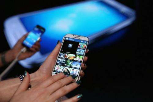 Fans get hands on with the Samsung Galaxy S4 on April 25, 2013 in New York City