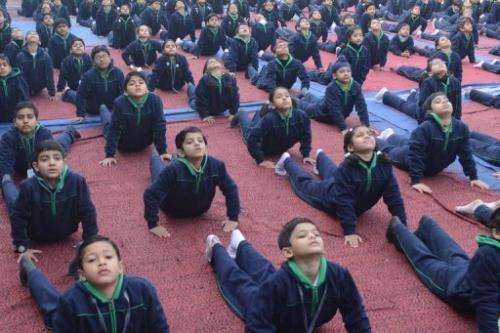 File illustration photo of Indian schoolchildren performing yoga at a school in Amritsar, on February 18, 2013
