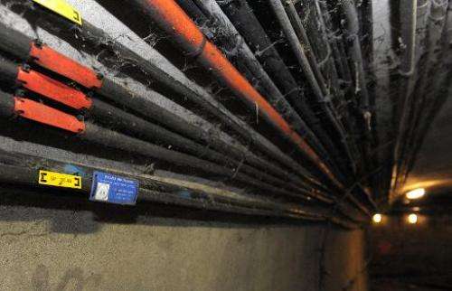 File photo taken on December 18 2012 shows fibre-optic internet cables in the sewers of Paris