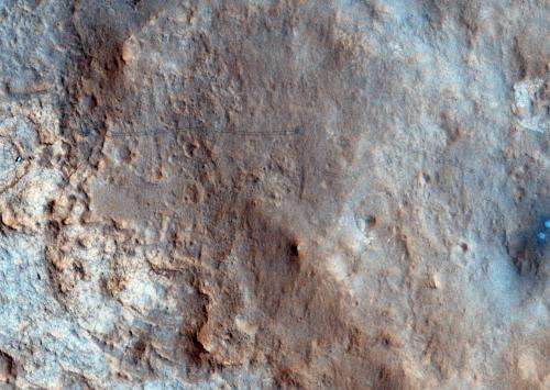 First color image of Curiosity’s tracks from orbit
