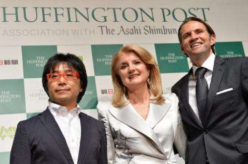 Founder Arianna Huffington (centre)  in Tokyo on May 7, 2013 at the launch of The Huffington Post's Japanese edition