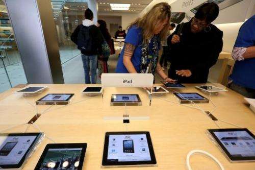 Fourth generation Apple iPads are seen on display at an Apple store on February 5, 2013 in San Francisco, California