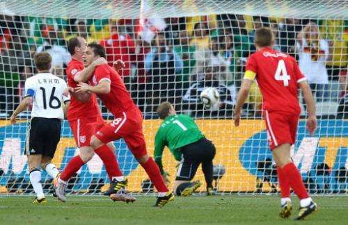 Frank Lampard (3rd L) scores a denied goal during the 2010 World Cup on June 27, 2010 at Free State stadium