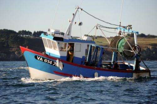 French fishermen leave the port of Quiberon, western France on October 30, 2012