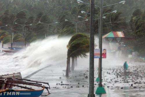 High waves pound the Filipino city of Legaspi as Typhoon Haiyan makes landfall on November 8, 2013