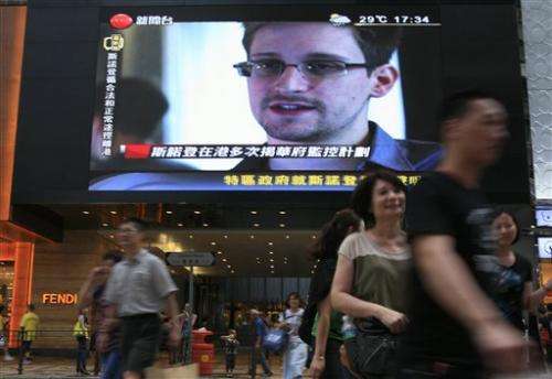 Hong Kong says Snowden has left for third country