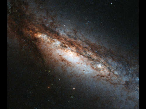 Hubble sees a bizarre cosmic rarity: NGC 660