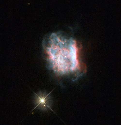 Hubble sees J 900 masquerading as a double star