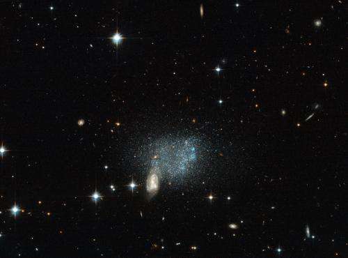 Hubble sees stars fleeing a cosmic crash
