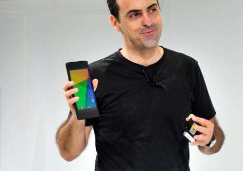 Hugo Barra, Vice President, Android Management at Google, displays a new Asus Nexus 7 tablet during a media event at Dogpatch St
