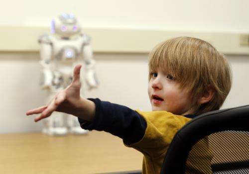 Humanoid robot helps train children with autism