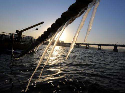 Icicles hang from a rope tied to a leisure boat on the Han river in Seoul, on January 24, 2007