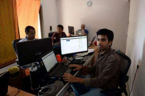 Indian software developer Nischal Shetty (right) at his office in Vashi, on May 7, 2013