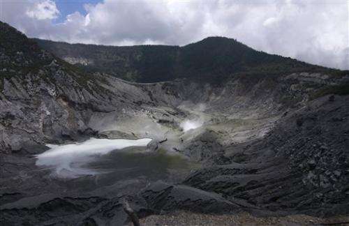 Indonesian volcano spews ash into sky; no one hurt