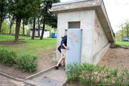 In Riga on May 10, 2013, a man enters an ex-Soviet bunker now hosting servers of cloud computing company DEAC