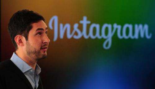 Instagram co-founder Kevin Systrom addresses a press conference in New York, December 12, 2013