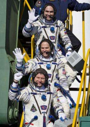 ISS crew members, Ford,  Novitskiy and Tarelkin are shown October 23, 2012, shortly before departure