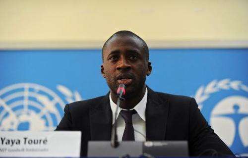 Ivory Coast's football player Yaya Toure speaks during a press conference as he was appointed the United Nations Environment Pro