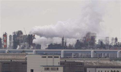 Japan dials back climate change emissions target