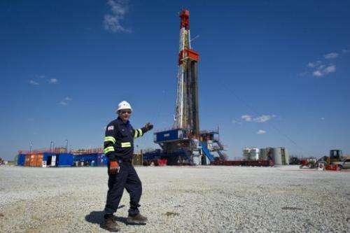 Jeff Boggs of Consol Energy in in front of a rig exploring the Marcellus Shale outside Waynesburg, PA on April 13, 2012