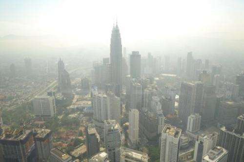 Kuala Lumpur's skyline is seen covered by haze, on June 27, 2013