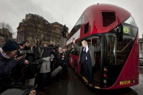 London Mayor Boris Johnson introduces a new prototype London bus using hybrid technology in London on December 16, 2011
