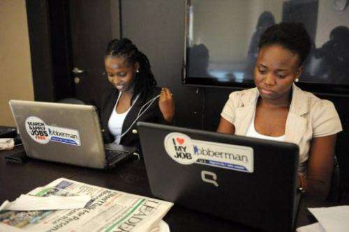 Marketing officers with job-finder site Jobberman work on June 17, 2013, in the upmarket Lagos suburb of Lekki