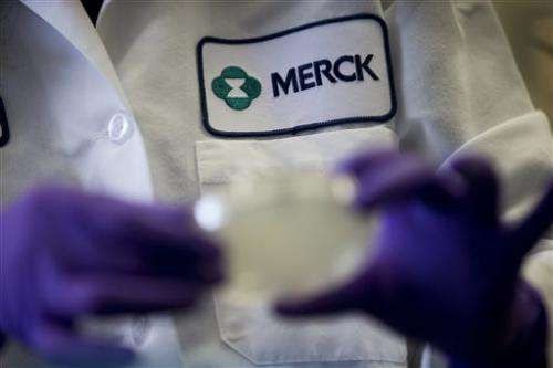 Merck 2Q profit tumbles on charges, lower revenue