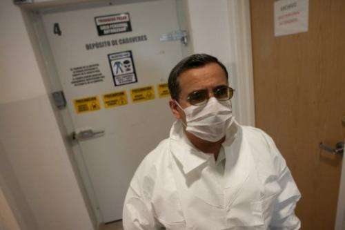 Mexican dentist Alejandro Hernandez Cardenas speaks with reporter about the procedure in Ciudad Juarez on March 6, 2013