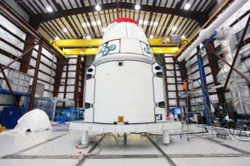 NASA photo on February 19, 2013 shows the SpaceX, Dragon spacecraft  in a hangar at Cape Canaveral