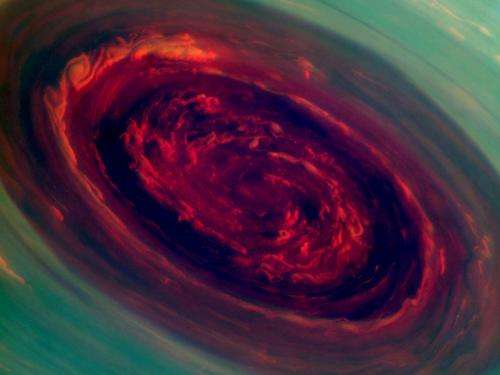 Nasa probe gets close views of large Saturn hurricane