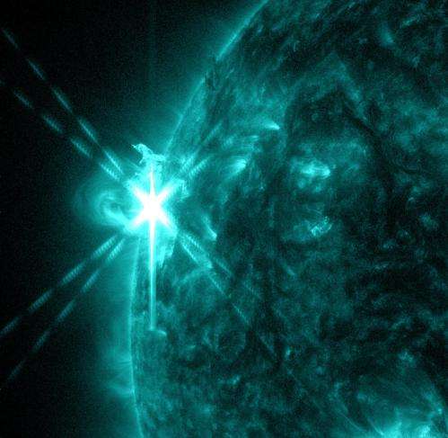 NASA sees sun emit mid-level flare