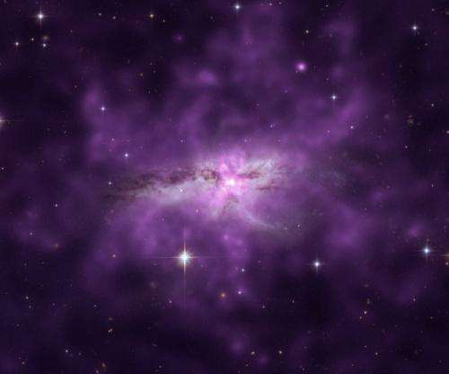 NGC 6240: Colossal hot cloud envelopes colliding galaxies