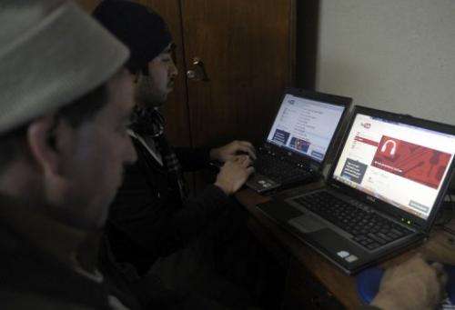Pakistani computer users browse YouTube at an office in Quetta on December 29, 2012