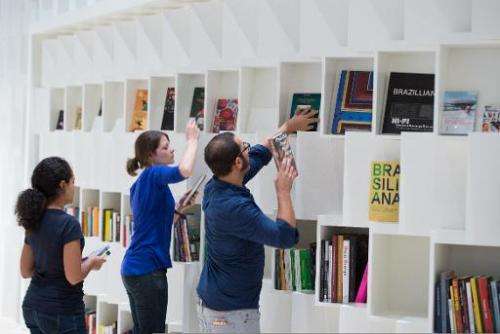 People prepare the Brazil booth on October 7, 2013 ahead of the Frankfurt book fair