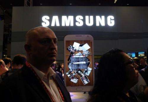 People visit the Samsung booth during the 2013 International CES in Las Vegas, on January 8, 2013