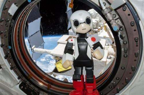 Pint-sized Japanese android Kirobo speaks from inside the International Space Station (ISS), on August 21, 2013