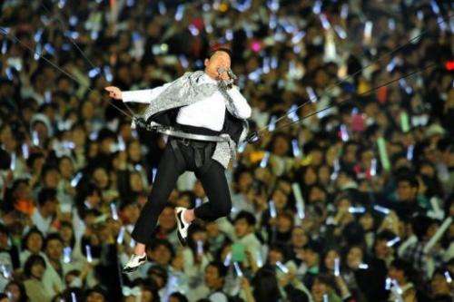 &quot;Gangnam Style&quot; star Psy performs during his concert &quot;Happening&quot; in Seoul April 13, 2013