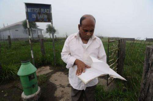 Ramkrishna Sharma, 53, in-charge of the rain-measuring int Mawsynram village, northeast India, June 21, 2013
