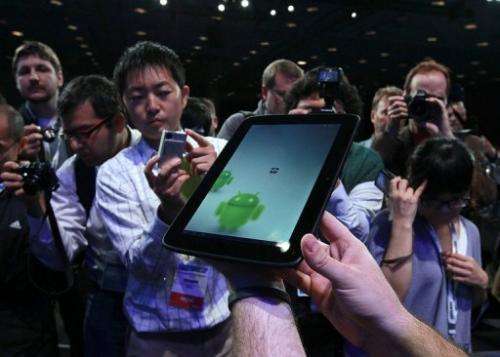 Reporters look a prototype of an Android tablet on September 13, 2011 in San Francisco