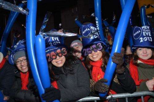 Revelers take part in new year's eve festivities in New York's Times Square on December 31, 2012