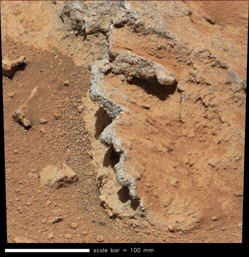 Rounded stones on Mars evidence of flowing water